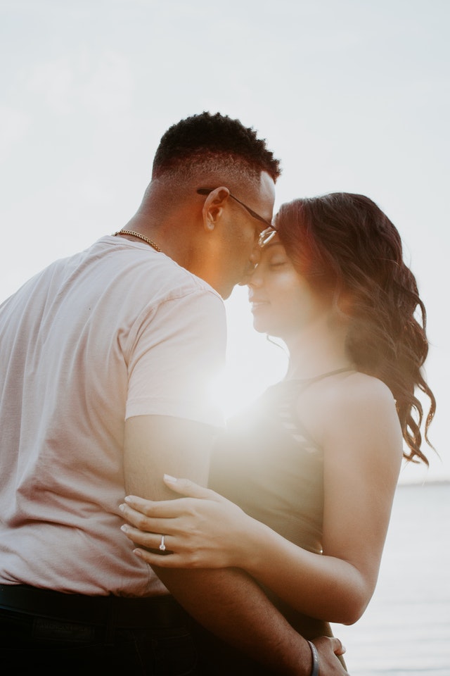 Kissing couple, happy couple, engaged planning celebrations